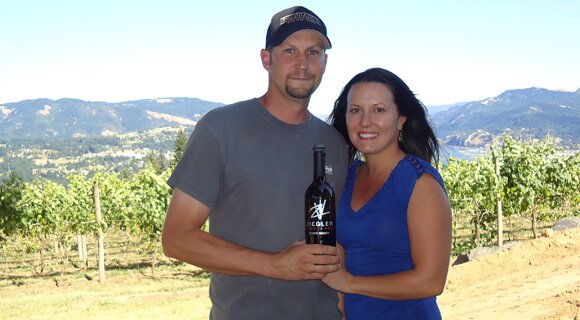 Nathan and Sarah Ziegler cradle a bottle of their Tempranillo from the Ziegler Vineyards in the Gorge.